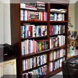 F04. 2 Solid wood bookcases with crown molding. Each 82”h x 32”w x 17”d